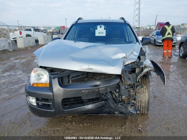12562063 :رقم المزاد ، KNDJE723677446127 vin ، 2007 Kia Sportage Ex/lx مزاد بيع