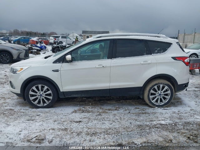 Продажа на аукционе авто 2017 Ford Escape Titanium, vin: 1FMCU9J97HUA67133, номер лота: 12562388
