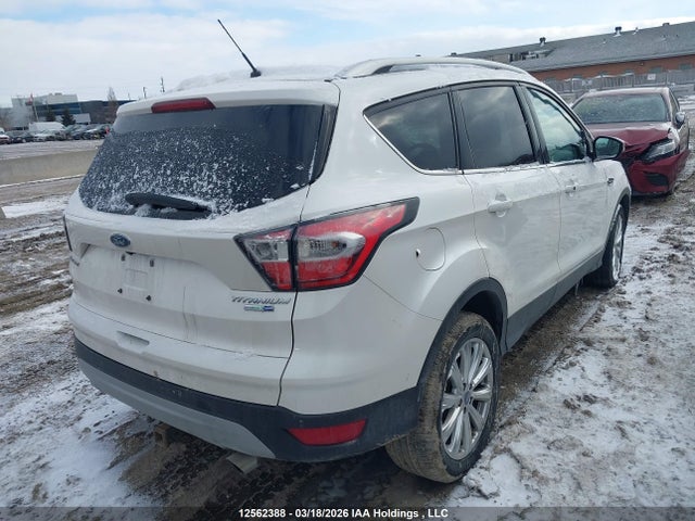 Продажа на аукционе авто 2017 Ford Escape Titanium, vin: 1FMCU9J97HUA67133, номер лота: 12562388
