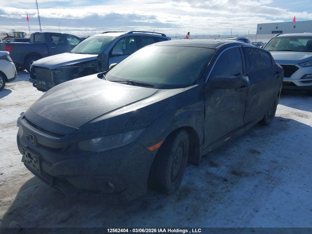 12562404 :رقم المزاد ، 2HGFC2F81MH011327 vin ، 2021 Honda Civic Sport مزاد بيع