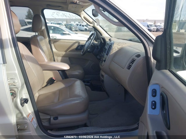 12562673 :رقم المزاد ، 1FMCU94173KC02573 vin ، 2003 Ford Escape Limited مزاد بيع