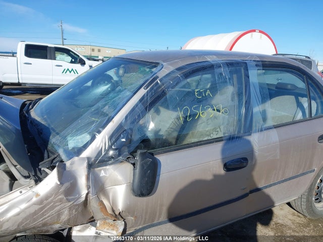 12563170 :رقم المزاد ، 2T1BA05E5TC136371 vin ، 1996 Toyota Corolla Dx مزاد بيع