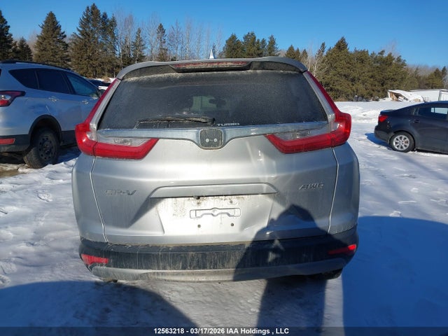 12563218 :رقم المزاد ، 2HKRW2H23KH133610 vin ، 2019 Honda Cr-v Lx مزاد بيع