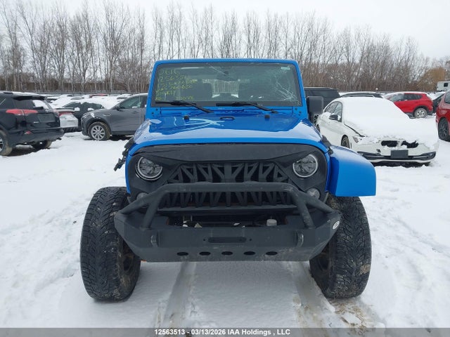 12563513 :رقم المزاد ، 1C4AJWBG4FL760650 vin ، 2015 Jeep Wrangler Sahara مزاد بيع