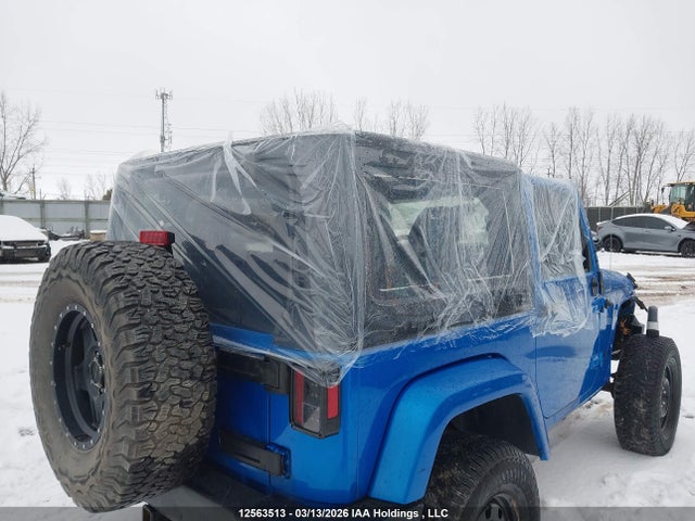 12563513 :رقم المزاد ، 1C4AJWBG4FL760650 vin ، 2015 Jeep Wrangler Sahara مزاد بيع