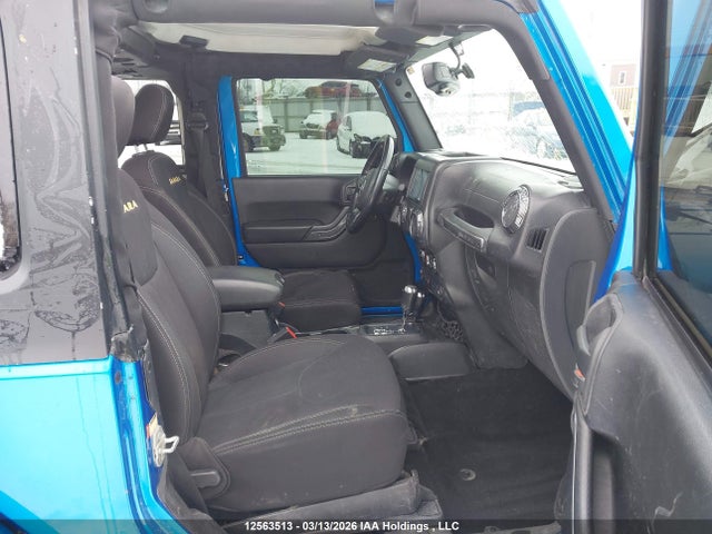 12563513 :رقم المزاد ، 1C4AJWBG4FL760650 vin ، 2015 Jeep Wrangler Sahara مزاد بيع