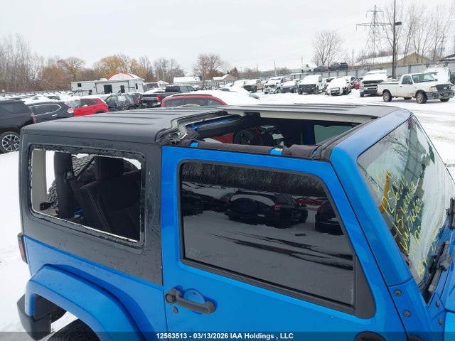 12563513 :رقم المزاد ، 1C4AJWBG4FL760650 vin ، 2015 Jeep Wrangler Sahara مزاد بيع
