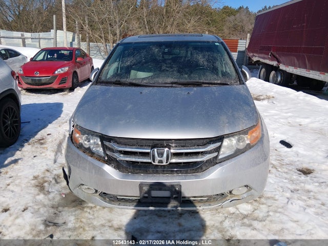 12543143 :رقم المزاد ، 5FNRL5H61EB099487 vin ، 2014 Honda Odyssey Ex-l مزاد بيع