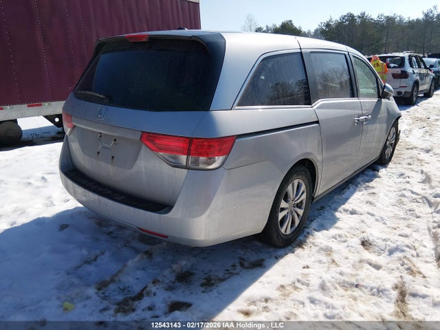 12543143 :رقم المزاد ، 5FNRL5H61EB099487 vin ، 2014 Honda Odyssey Ex-l مزاد بيع