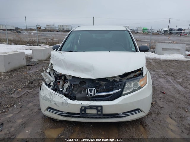 12564768 :رقم المزاد ، 5FNRL5H30EB505376 vin ، 2014 Honda Odyssey Se مزاد بيع