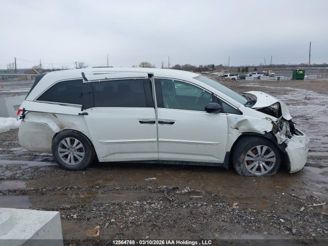 12564768 :رقم المزاد ، 5FNRL5H30EB505376 vin ، 2014 Honda Odyssey Se مزاد بيع