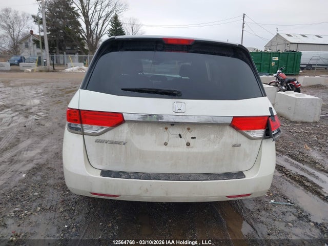 12564768 :رقم المزاد ، 5FNRL5H30EB505376 vin ، 2014 Honda Odyssey Se مزاد بيع