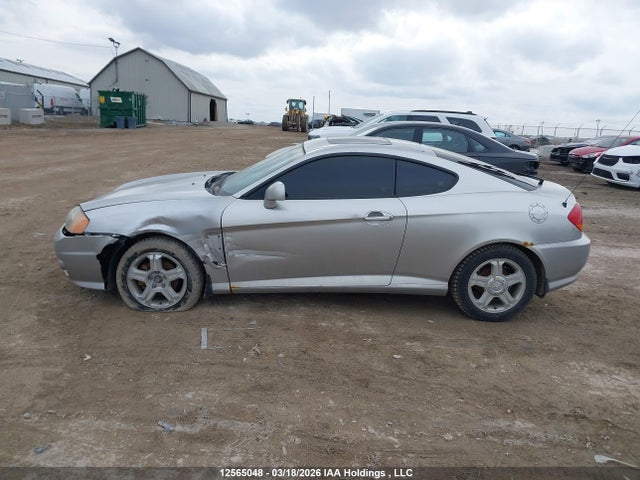 Продажа на аукционе авто 2004 Hyundai Tiburon Se, vin: KMHHN65D04U138859, номер лота: 12565048
