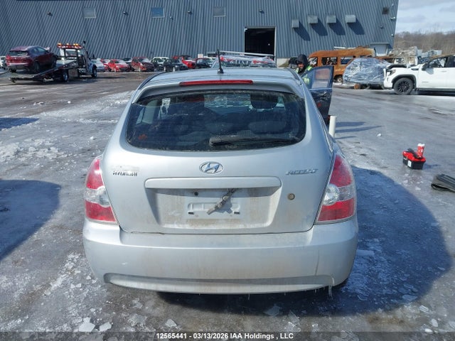 12565441 :رقم المزاد ، KMHCN35C19U133497 vin ، 2009 Hyundai Accent مزاد بيع