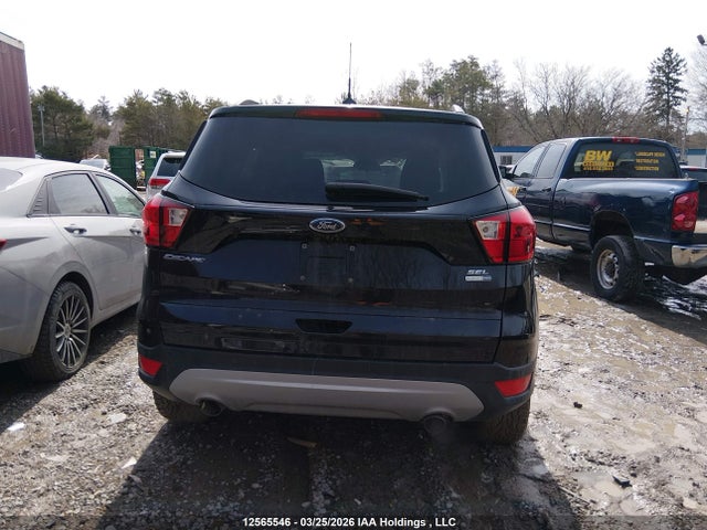 12565546 :رقم المزاد ، 1FMCU9HD2KUC58427 vin ، 2019 Ford Escape مزاد بيع