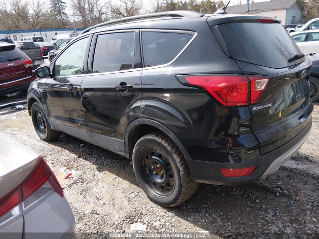 12565546 :رقم المزاد ، 1FMCU9HD2KUC58427 vin ، 2019 Ford Escape مزاد بيع