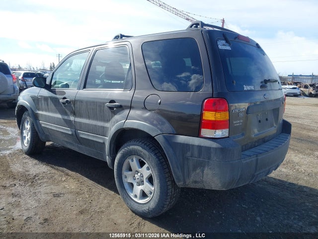 12565915 :رقم المزاد ، 1FMYU93116KB76256 vin ، 2006 Ford Escape Xlt مزاد بيع