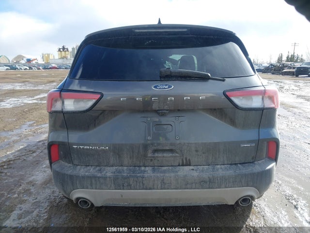 12561959 :رقم المزاد ، 1FMCU9DZ5LUA87935 vin ، 2020 Ford Escape Titanium Hybrid مزاد بيع