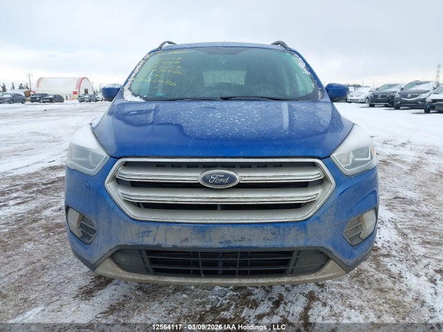 12564117 :رقم المزاد ، 1FMCU9HD0JUC82627 vin ، 2018 Ford Escape Sel مزاد بيع