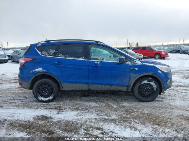 12564117 :رقم المزاد ، 1FMCU9HD0JUC82627 vin ، 2018 Ford Escape Sel مزاد بيع