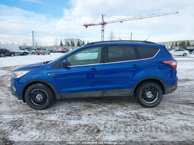 12564117 :رقم المزاد ، 1FMCU9HD0JUC82627 vin ، 2018 Ford Escape Sel مزاد بيع