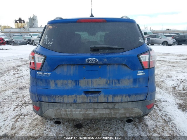 12564117 :رقم المزاد ، 1FMCU9HD0JUC82627 vin ، 2018 Ford Escape Sel مزاد بيع