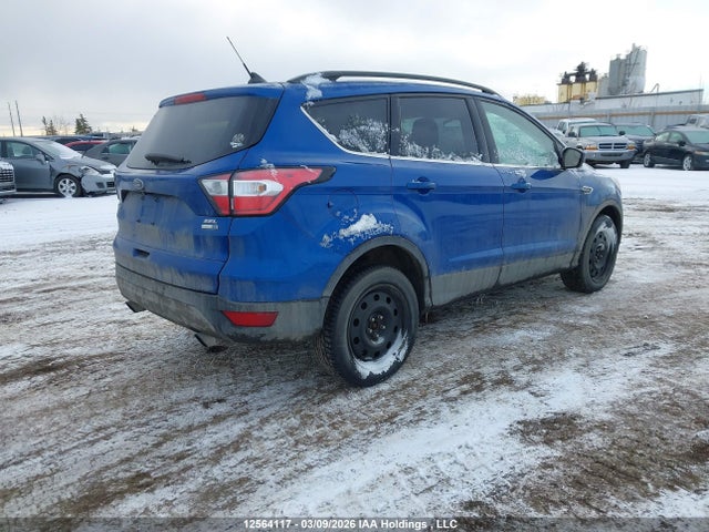 12564117 :رقم المزاد ، 1FMCU9HD0JUC82627 vin ، 2018 Ford Escape Sel مزاد بيع