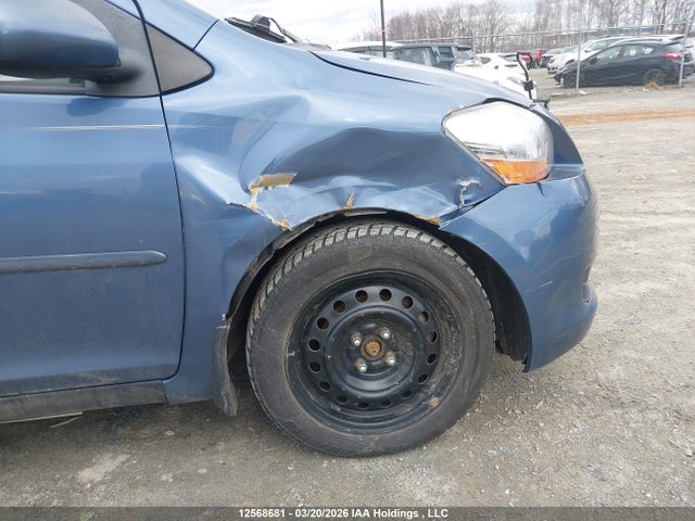 12568681 :رقم المزاد ، JTDBT923X91337407 vin ، 2009 Toyota Yaris مزاد بيع