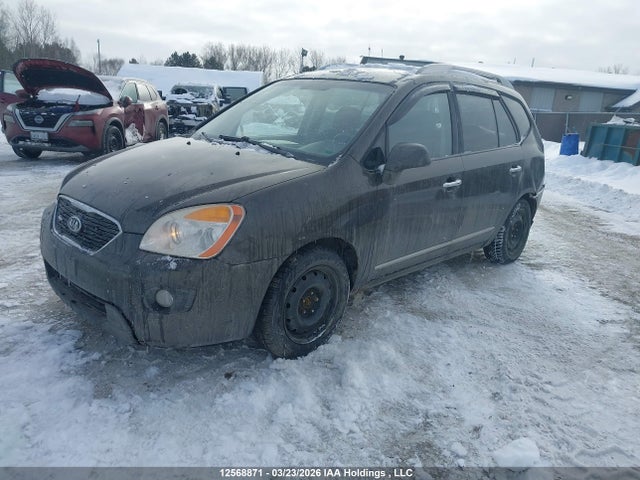 12568871 :رقم المزاد ، KNAHH8A85B7363352 vin ، 2011 Kia Rondo Ex/ex-premium مزاد بيع