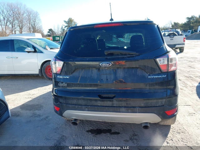 Продаж на аукціоні авто 2017 Ford Escape Titanium, vin: 1FMCU9J91HUD87757, номер лоту: 12569046