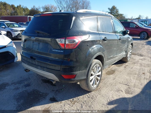Продаж на аукціоні авто 2017 Ford Escape Titanium, vin: 1FMCU9J91HUD87757, номер лоту: 12569046