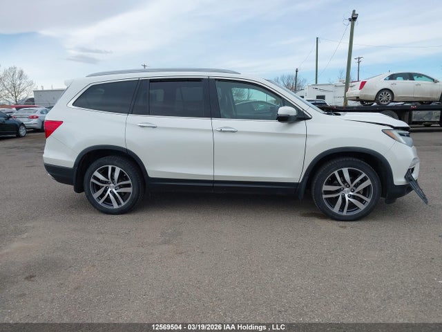 5FNYF6H95HB506718 Honda Pilot Touring