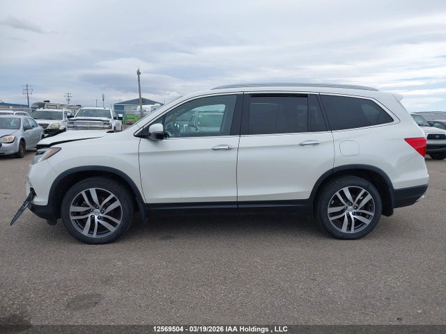 5FNYF6H95HB506718 Honda Pilot Touring