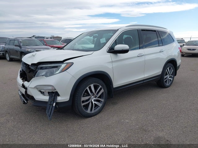 5FNYF6H95HB506718 Honda Pilot Touring