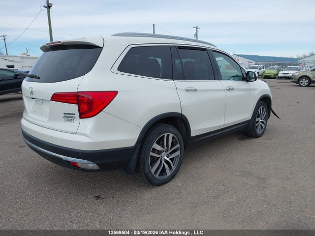 5FNYF6H95HB506718 Honda Pilot Touring