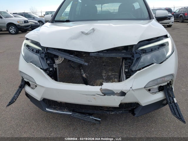 5FNYF6H95HB506718 Honda Pilot Touring
