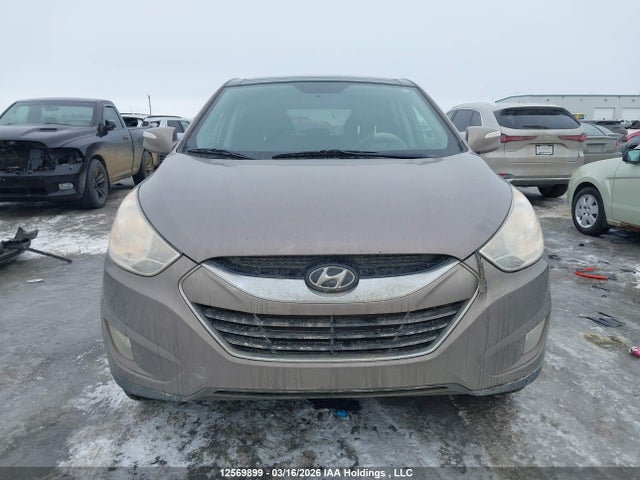 Продажа на аукционе авто 2012 Hyundai Tucson Limited, vin: KM8JUCAC0CU424242, номер лота: 12569899