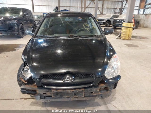 12569947 :رقم المزاد ، KMHCN35C59U148648 vin ، 2009 Hyundai Accent مزاد بيع