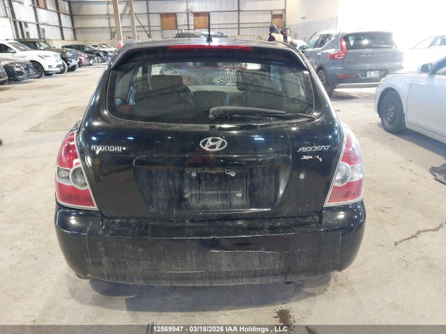 12569947 :رقم المزاد ، KMHCN35C59U148648 vin ، 2009 Hyundai Accent مزاد بيع