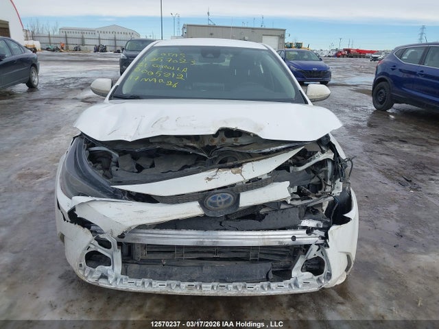 12570237 :رقم المزاد ، JTDBAMDE1MJ005212 vin ، 2021 Toyota Corolla Hybrid Base W/li Battery مزاد بيع