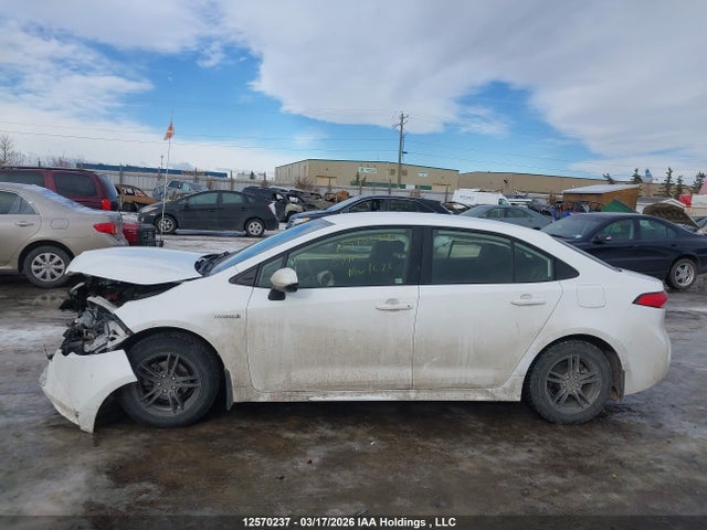 12570237 :رقم المزاد ، JTDBAMDE1MJ005212 vin ، 2021 Toyota Corolla Hybrid Base W/li Battery مزاد بيع