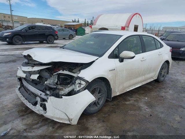 12570237 :رقم المزاد ، JTDBAMDE1MJ005212 vin ، 2021 Toyota Corolla Hybrid Base W/li Battery مزاد بيع
