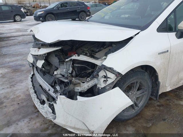 12570237 :رقم المزاد ، JTDBAMDE1MJ005212 vin ، 2021 Toyota Corolla Hybrid Base W/li Battery مزاد بيع