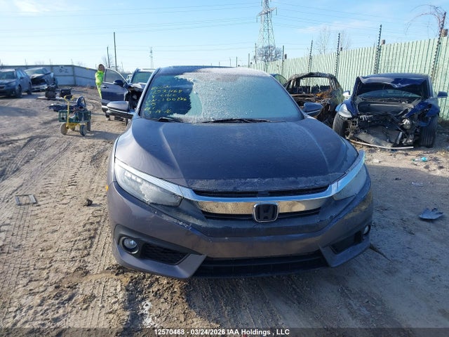 2HGFC1F90JH100286 Honda Civic Touring