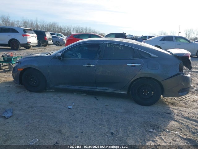 2HGFC1F90JH100286 Honda Civic Touring