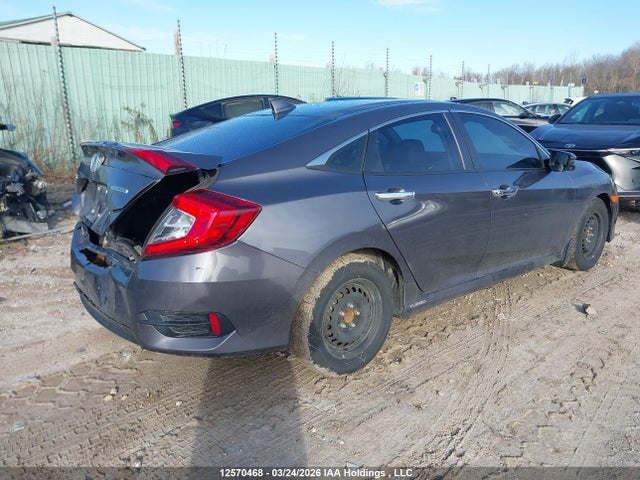 2HGFC1F90JH100286 Honda Civic Touring