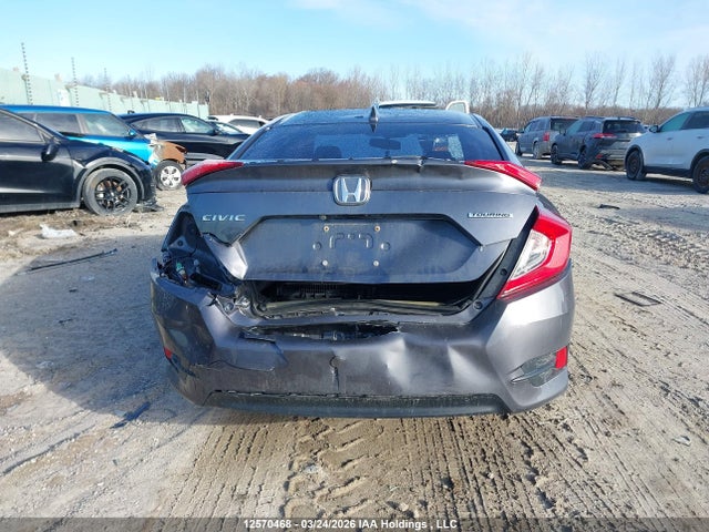 2HGFC1F90JH100286 Honda Civic Touring