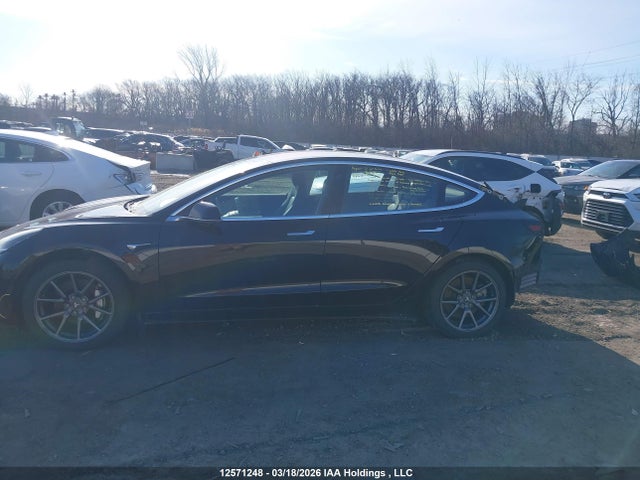 12571248 :رقم المزاد ، 5YJ3E1EA6JF020973 vin ، 2018 Tesla Model 3 مزاد بيع