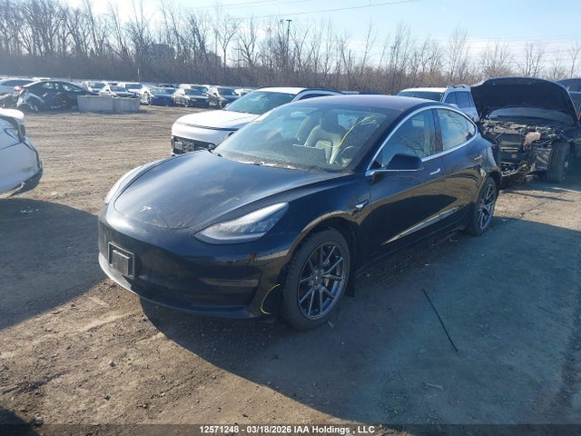 12571248 :رقم المزاد ، 5YJ3E1EA6JF020973 vin ، 2018 Tesla Model 3 مزاد بيع