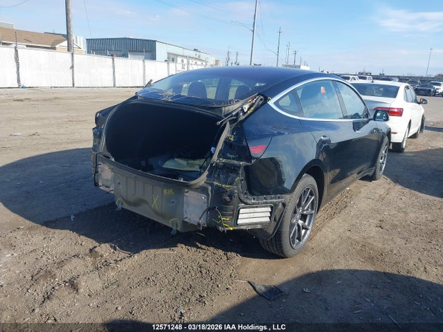 12571248 :رقم المزاد ، 5YJ3E1EA6JF020973 vin ، 2018 Tesla Model 3 مزاد بيع